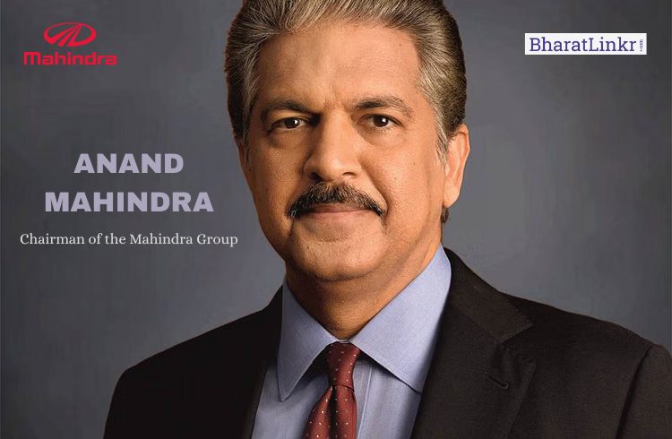 Anand Mahindra, Chairman of the Mahindra Group, photographed in formal attire against a neutral background.