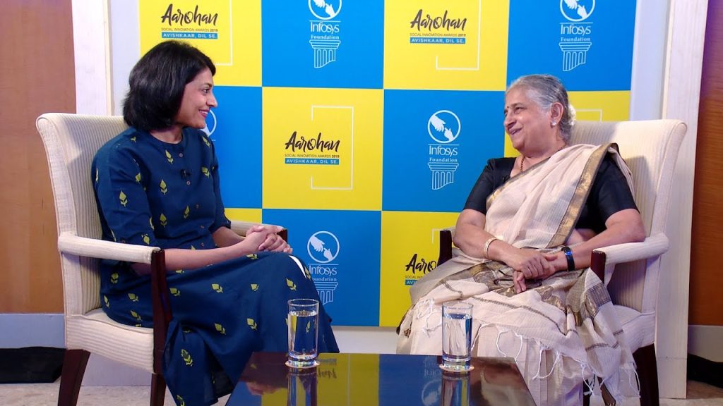 Infosys co-founder Sudha Murty and an interviewer at an Infosys Foundation Aarohan event.